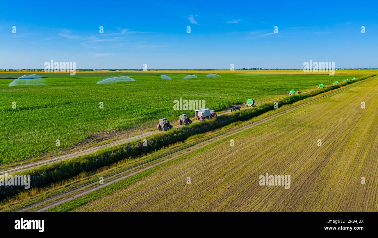 Above view over irrigation system, water jet rain guns sprinklers, on