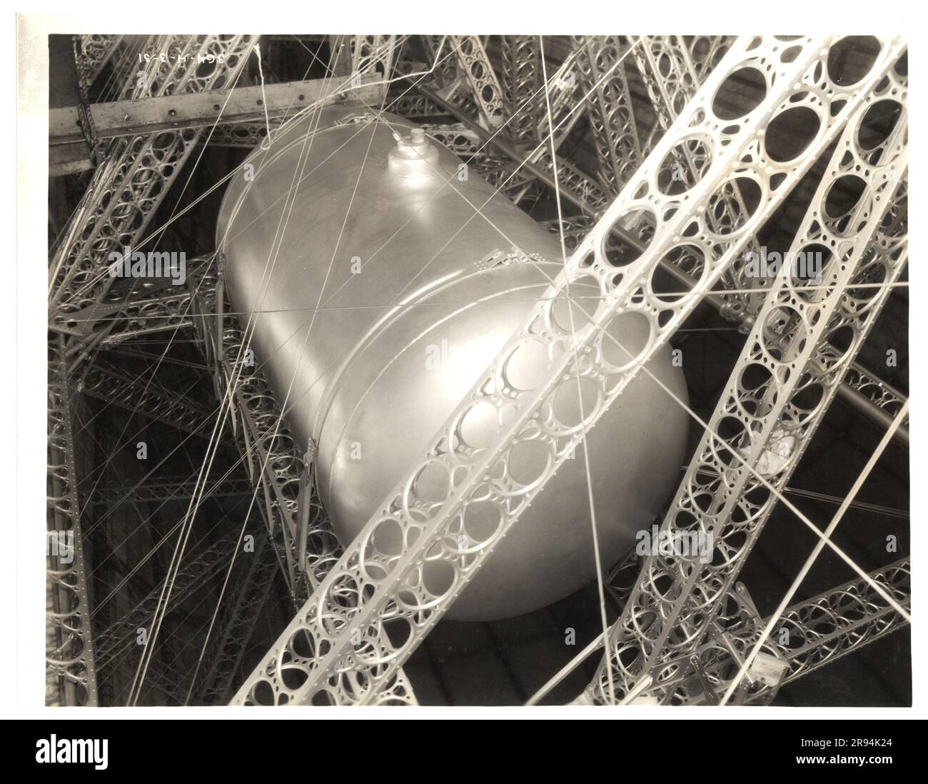 Photograph of a Oil Tank on the USS Akron. Original caption: One of the USS Akron's many oil tanks..  Dirigible Disasters. Stock Photo