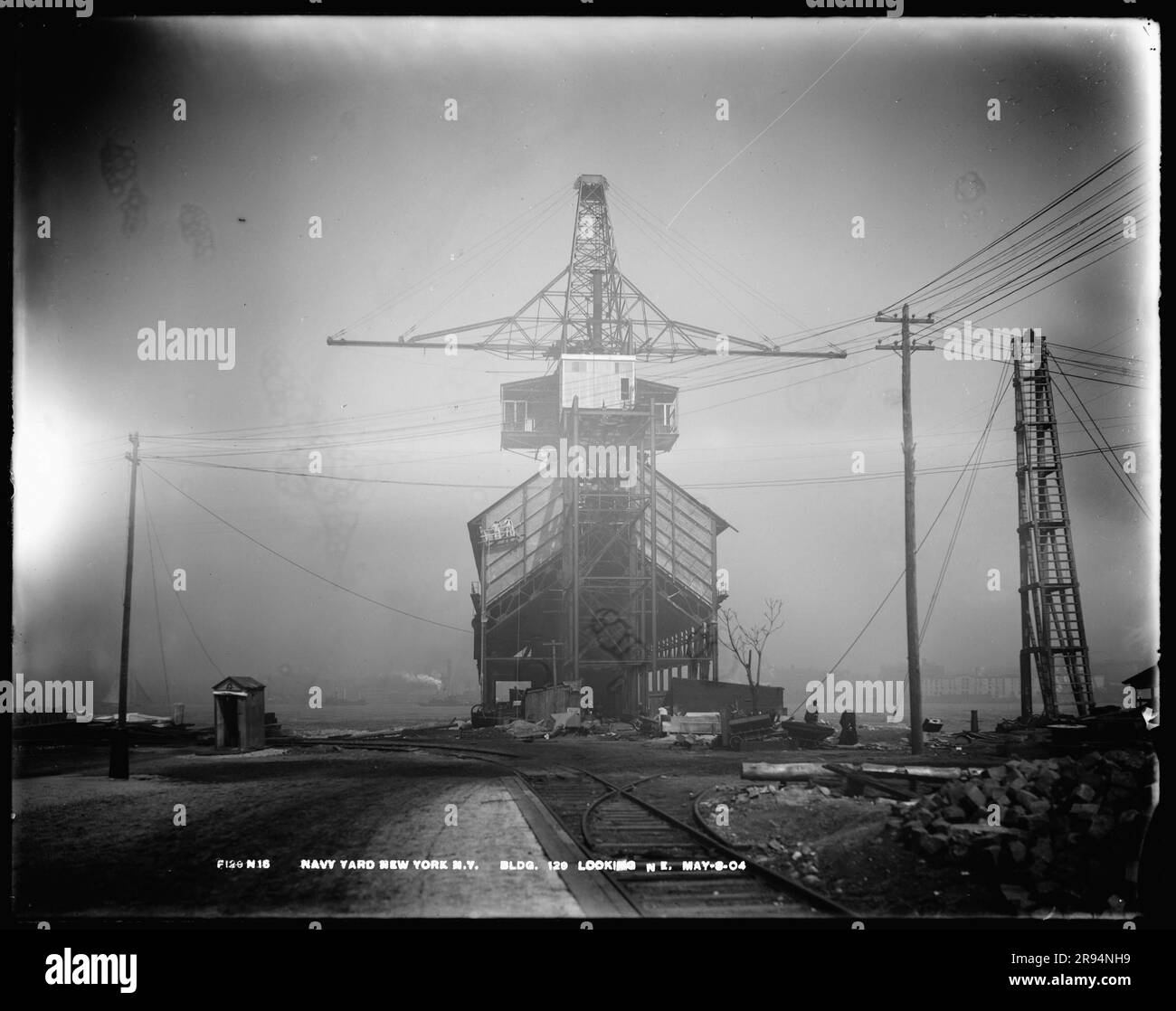 Building Number 129, Looking Northeast. Glass Plate Negatives of the Construction and Repair of Buildings, Facilities, and Vessels at the New York Navy Yard. Stock Photo