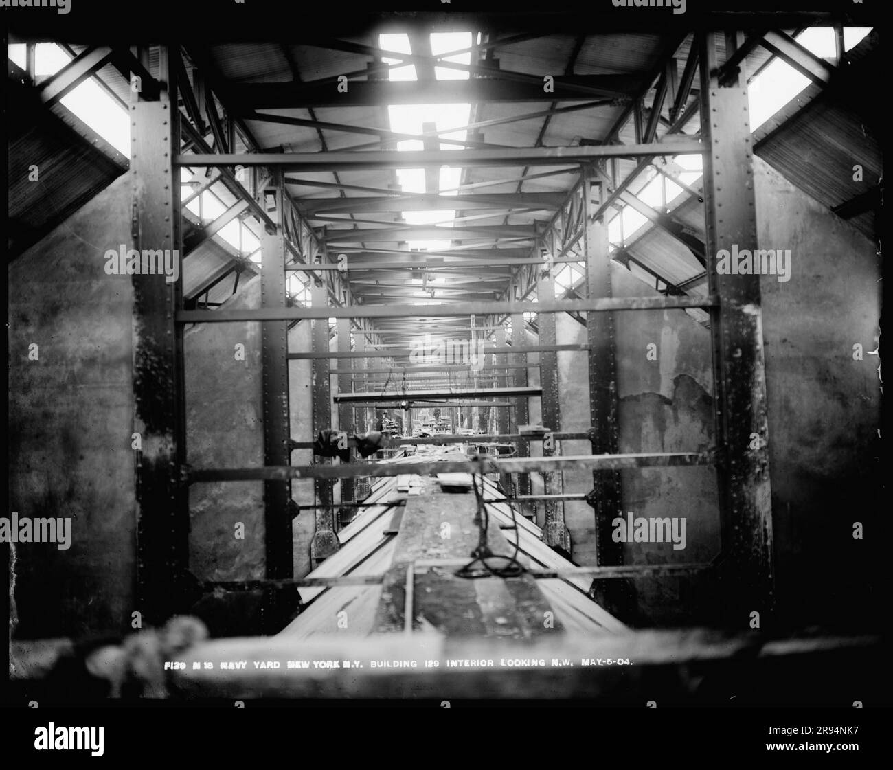 Building Number 129, Interior Looking Northeast. Glass Plate Negatives of the Construction and Repair of Buildings, Facilities, and Vessels at the New York Navy Yard. Stock Photo
