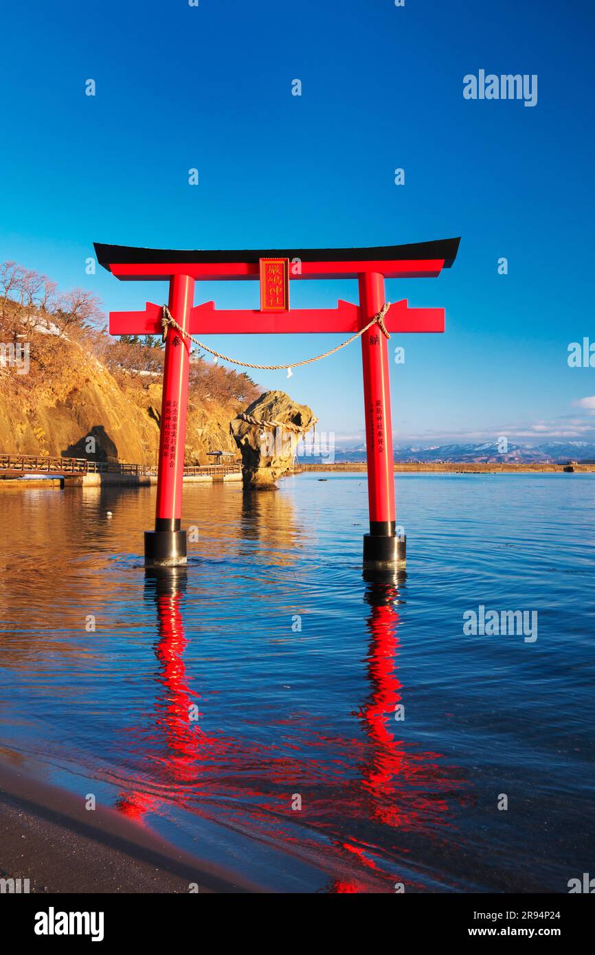 Itsukushima Shrine's torii gate and bottle rock Stock Photo