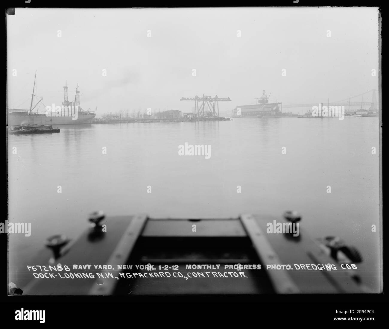 Monthly Progress Photo, Dredging Cob Dock, Looking Northwest, R. G. Packard Company, Contractor. Glass Plate Negatives of the Construction and Repair of Buildings, Facilities, and Vessels at the New York Navy Yard. Stock Photo