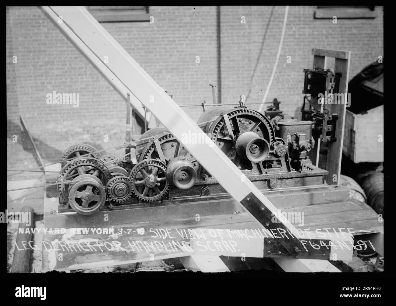 Side View of Machinery of Stiff Leg Derrick for Handling Scrap. Glass Plate Negatives of the Construction and Repair of Buildings, Facilities, and Vessels at the New York Navy Yard. Stock Photo