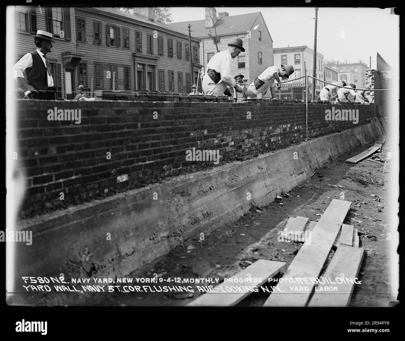 Monthly Progress Photo, Rebuilding Yard Wall, Navy Street Corner