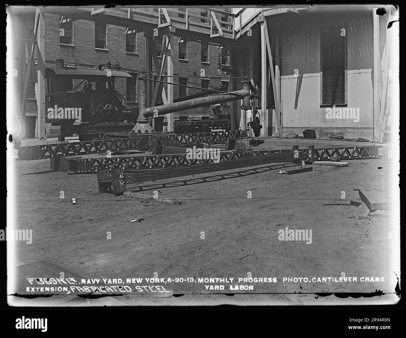 Monthly Progress Photo, Cantilever Crane Extension, Fabricated Steel, Yard Labor. Glass Plate