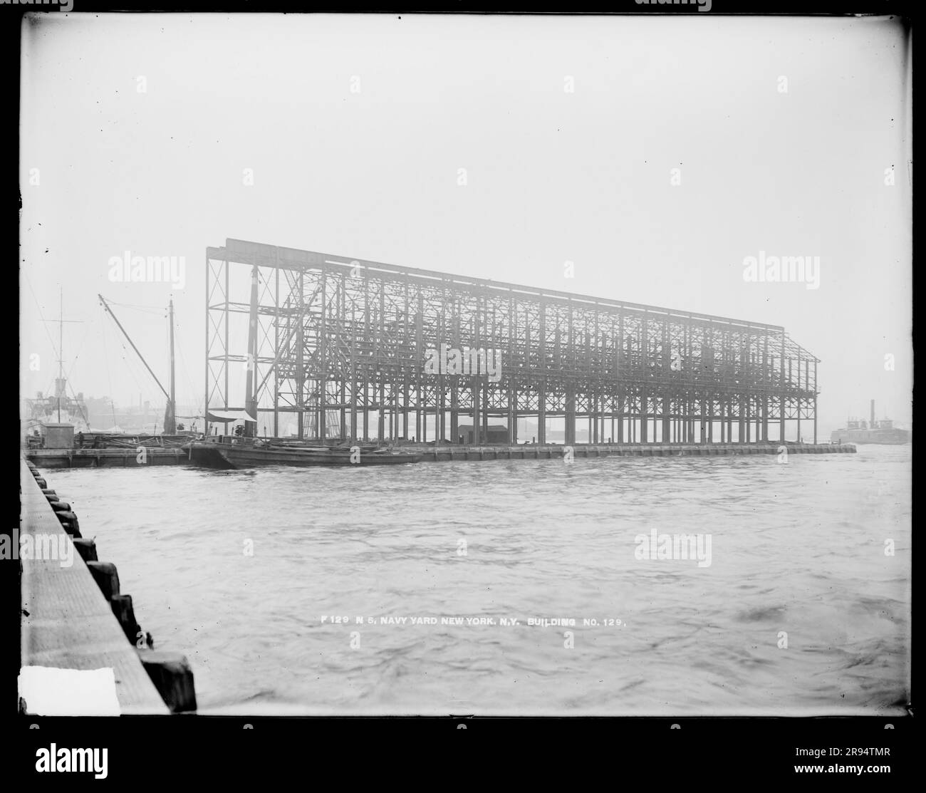 Building Number 129. Glass Plate Negatives of the Construction and Repair of Buildings, Facilities, and Vessels at the New York Navy Yard. Stock Photo