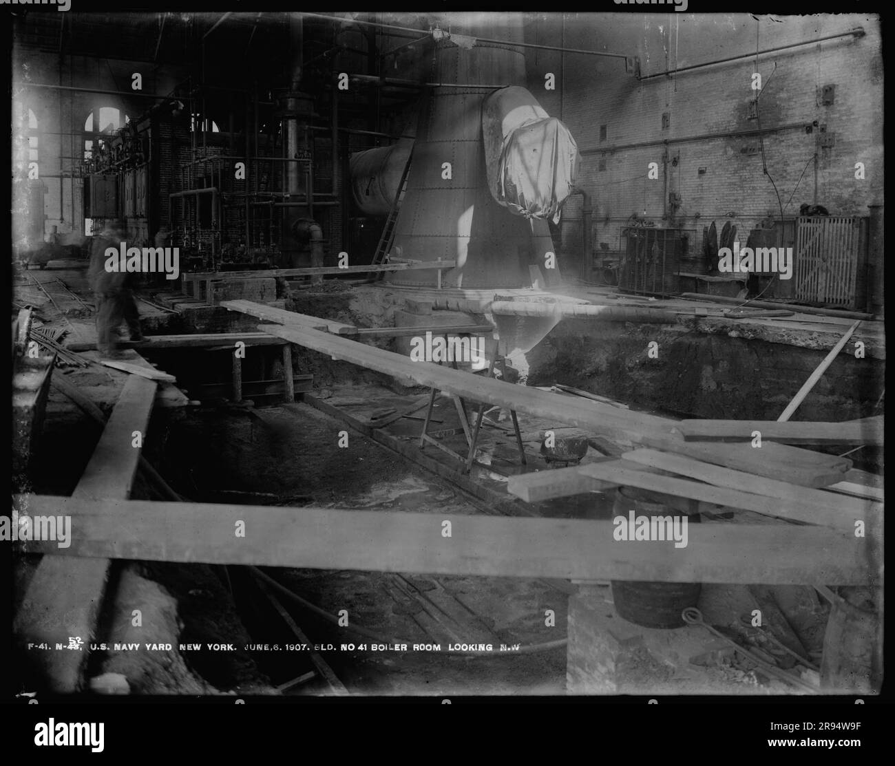 Building Number 41, Boiler Room, Looking Northwest. Glass Plate Negatives of the Construction and Repair of Buildings, Facilities, and Vessels at the New York Navy Yard. Stock Photo