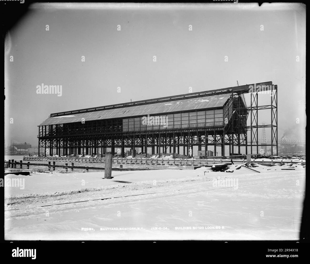 Building Number 129, Looking North. Glass Plate Negatives of the Construction and Repair of Buildings, Facilities, and Vessels at the New York Navy Yard. Stock Photo