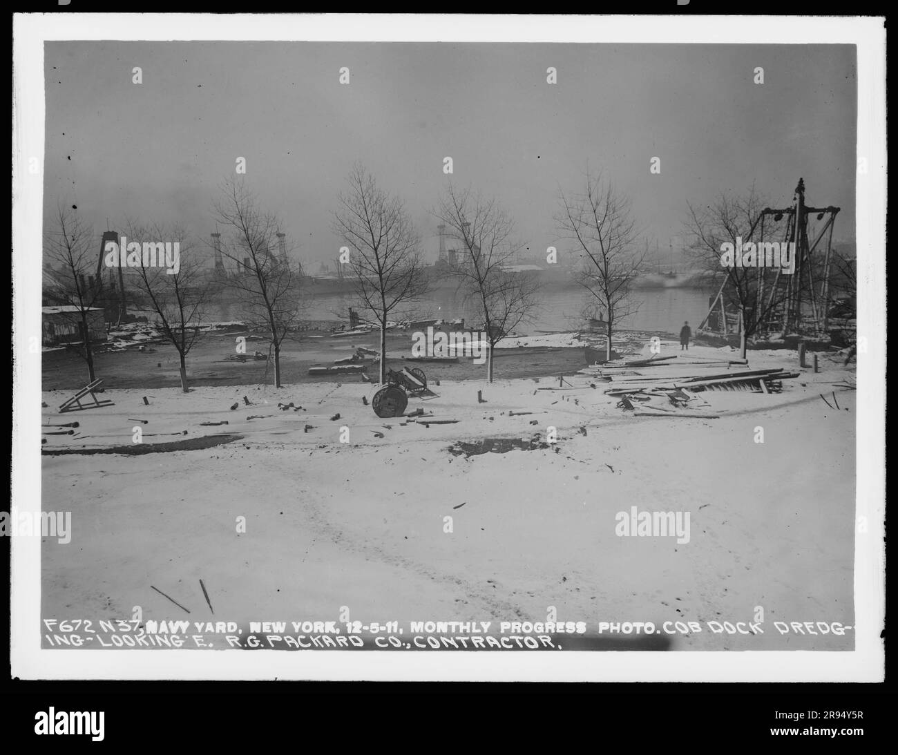 Monthly Progress Photo, Cob Dock Dredging, Looking East, R. G. Packard Company, Contractor. Glass Plate Negatives of the Construction and Repair of Buildings, Facilities, and Vessels at the New York Navy Yard. Stock Photo