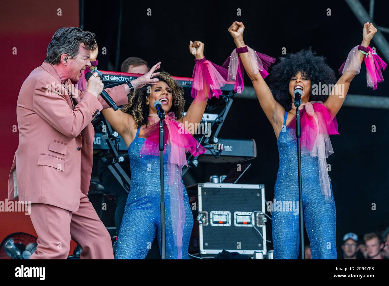 Glastonbury, UK. 24th June, 2023. Rick Astley (with backing singers) plays the Pyramid Stage - Saturday at the 2023 Glastonbury Festival, Worthy Farm, Glastonbury. Credit: Guy Bell/Alamy Live News Stock Photo