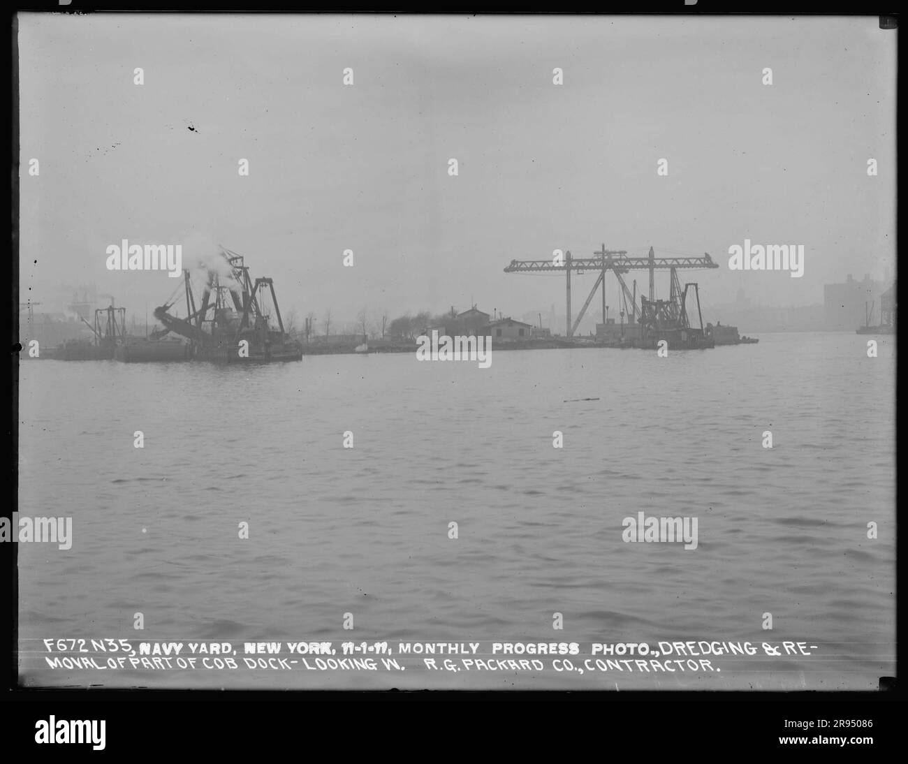 Monthly Progress Photo, Dredging and Removal of Part of Cob Dock, Looking West, R. G. Packard Company, Contractor. Glass Plate Negatives of the Construction and Repair of Buildings, Facilities, and Vessels at the New York Navy Yard. Stock Photo