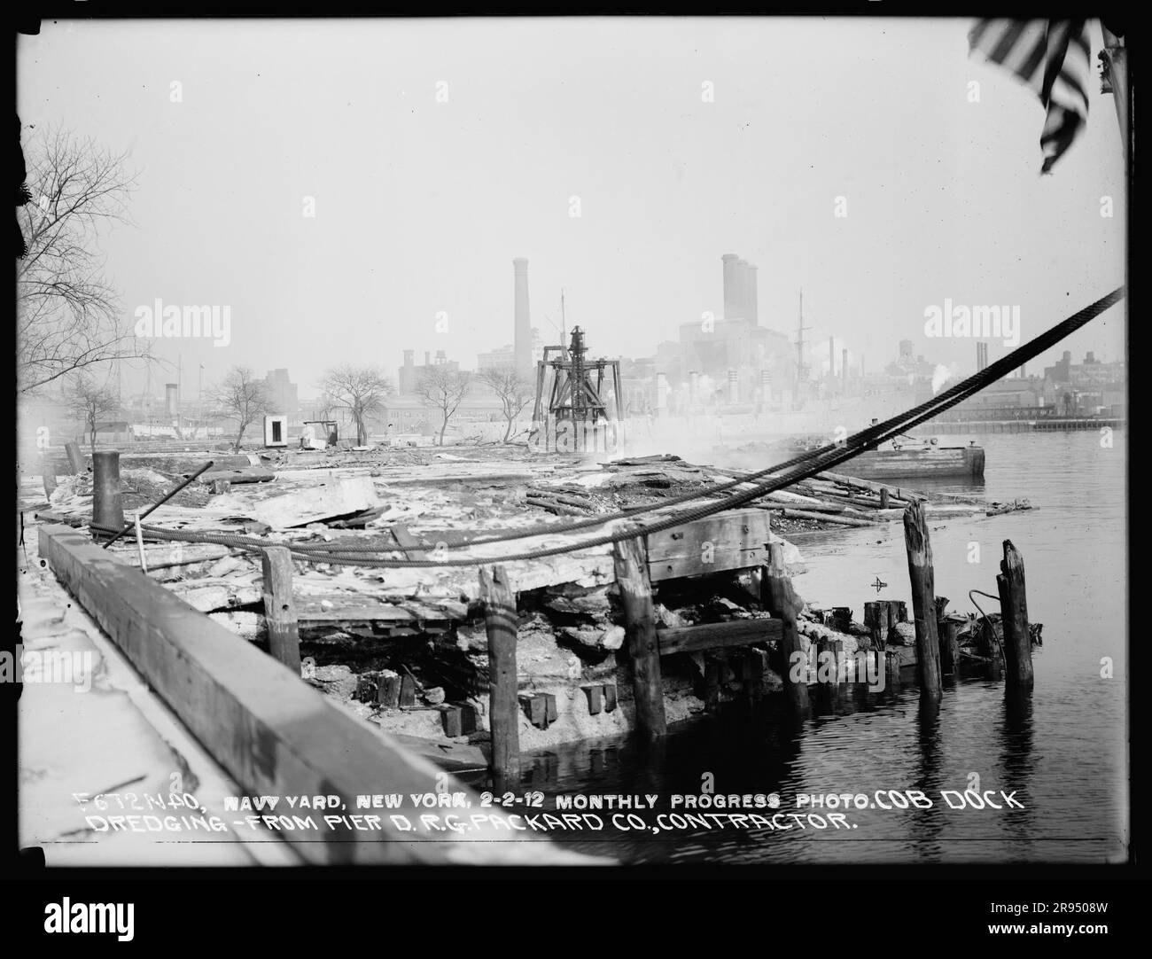 Monthly Progress Photo, Cob Dock Dredging, from Pier D, R. G. Packard Company, Contractor. Glass Plate Negatives of the Construction and Repair of Buildings, Facilities, and Vessels at the New York Navy Yard. Stock Photo