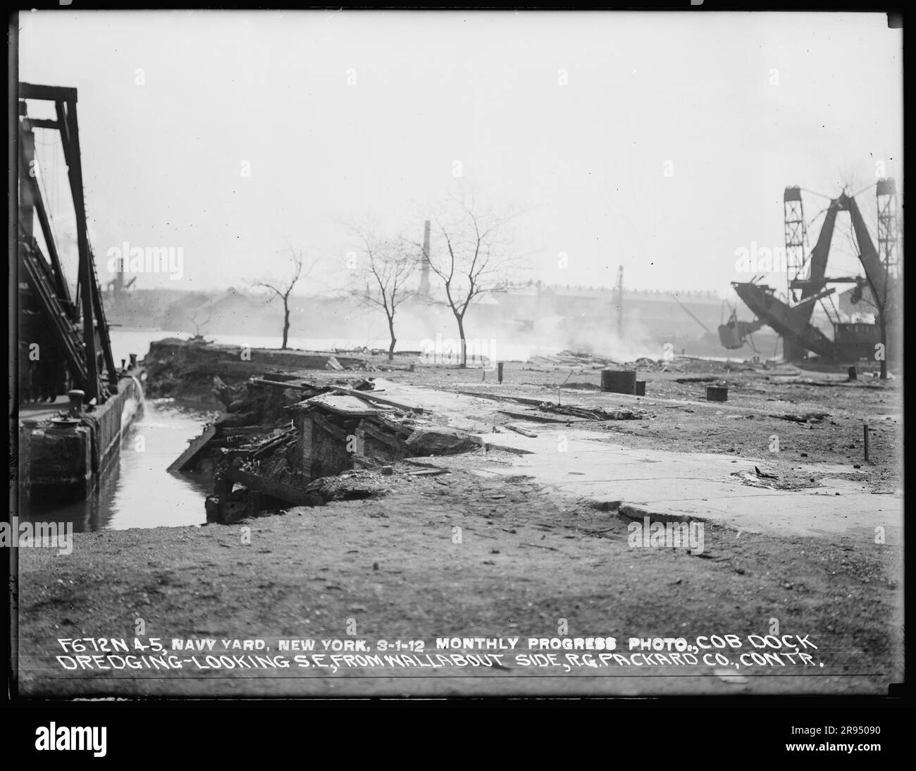 Monthly Progress Photo, Cob Dock Dredging, Looking Southeast, from Wallabout Side, R. G. Packard Company, Contractor. Glass Plate Negatives of the Construction and Repair of Buildings, Facilities, and Vessels at the New York Navy Yard. Stock Photo
