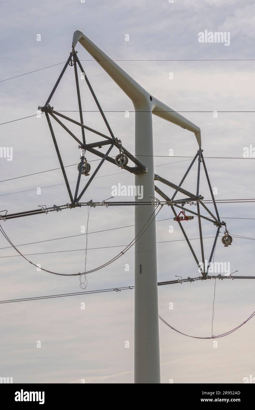 The process of pulling the cables through the diamond insulater sets