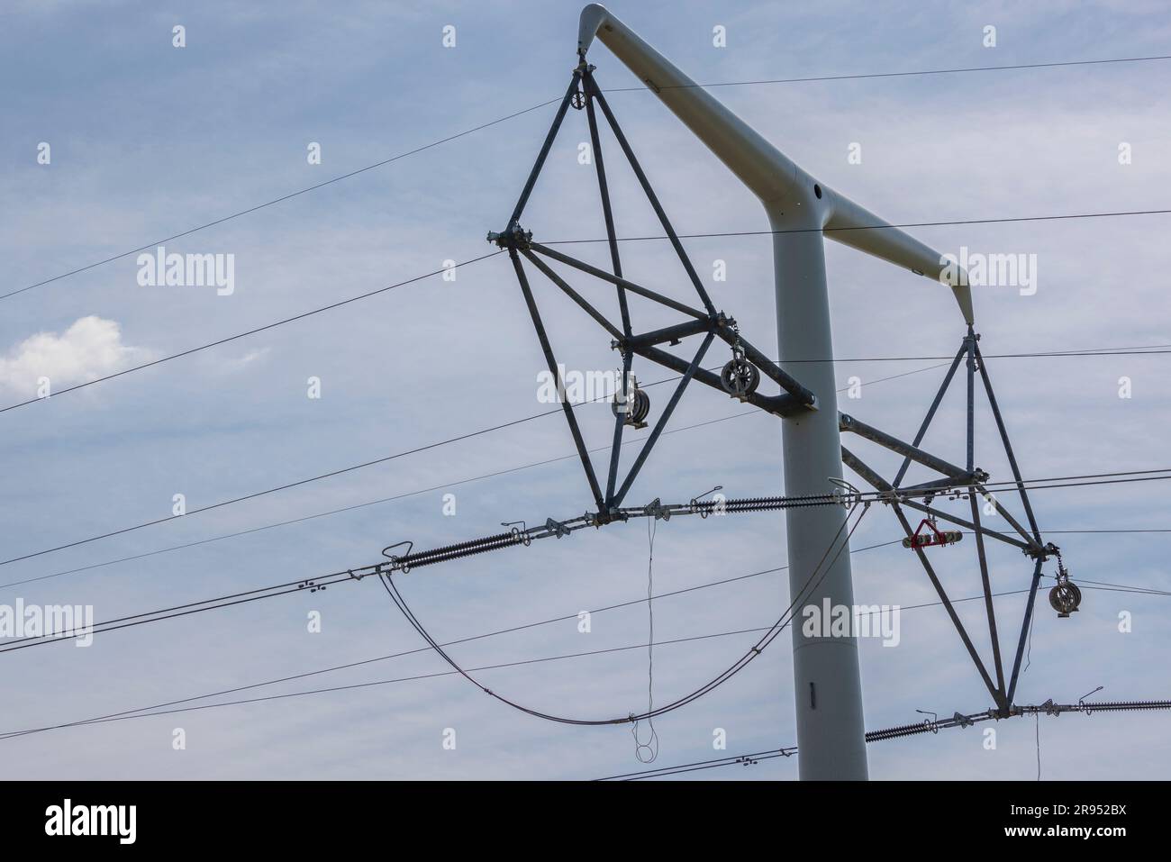 The process of pulling the cables through the diamond insulater sets