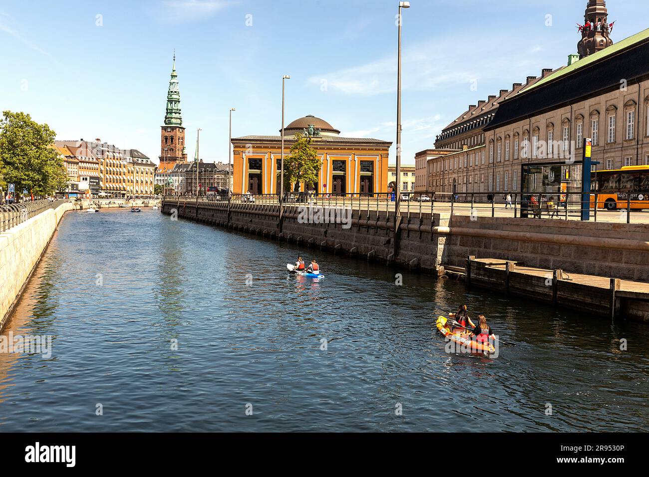 COPENHAGEN: A view with water activities at Frederiksholms Channel and part of the Parliament, Christiansborg, to the right and Thorvaldsen’s Museum i Stock Photo