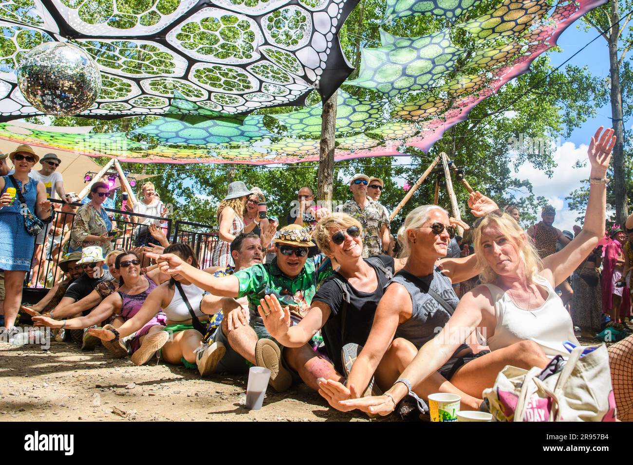 Somerset, UK. 24 June 2023. People dance in the Glade at the Glastonbury Festival at Worthy Farm in Somerset. Picture date: Saturday June 24, 2023. Photo credit should read: Matt Crossick/Empics/Alamy Live News Stock Photo