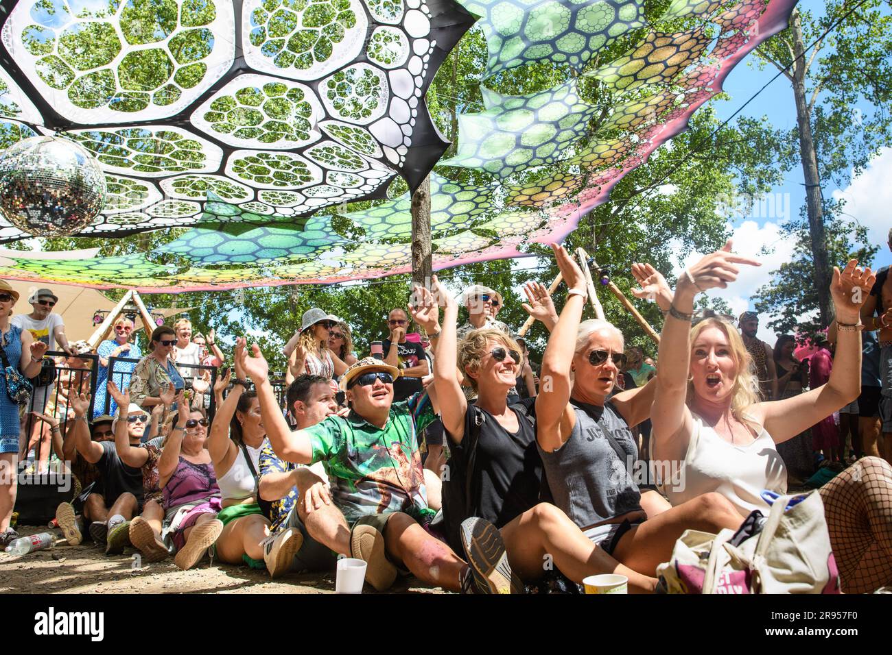 Somerset, UK. 24 June 2023. People dance in the Glade at the Glastonbury Festival at Worthy Farm in Somerset. Picture date: Saturday June 24, 2023. Photo credit should read: Matt Crossick/Empics/Alamy Live News Stock Photo