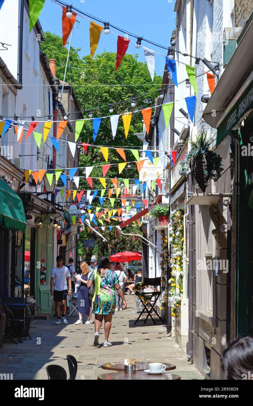 Small retail shops in Paved Court by Richmond Green on a sunny summers day Richmond on Thames Greater London England UK Stock Photo