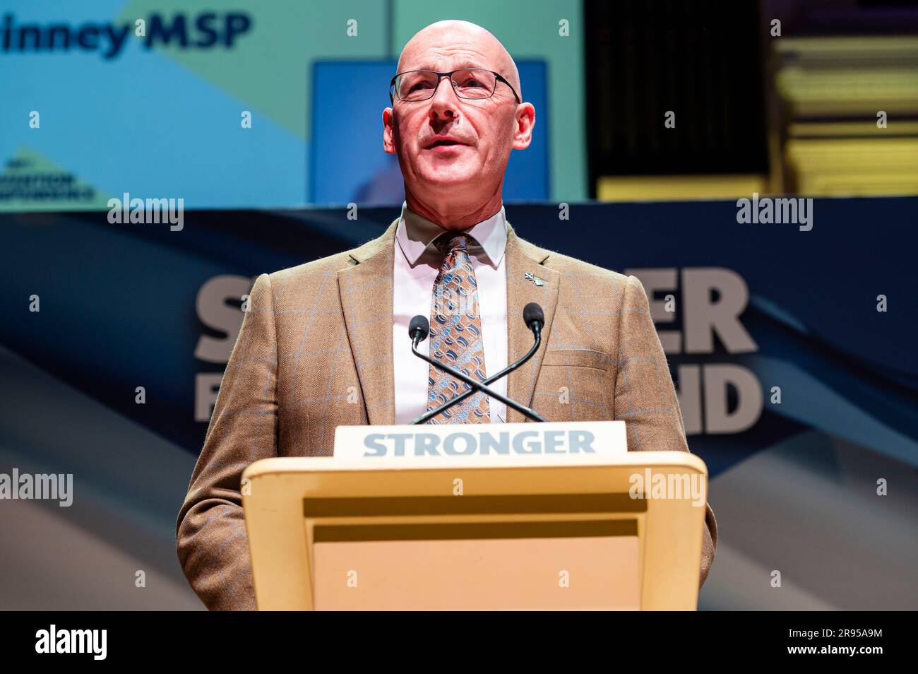 Dundee, UK. 24th June, 2023. John Swinney delivers a speech to SNP members who meet and discuss independence strategy at a SNP convention at the Caird Hall in Dundee. Credit: Euan Cherry/Alamy Live News Stock Photo