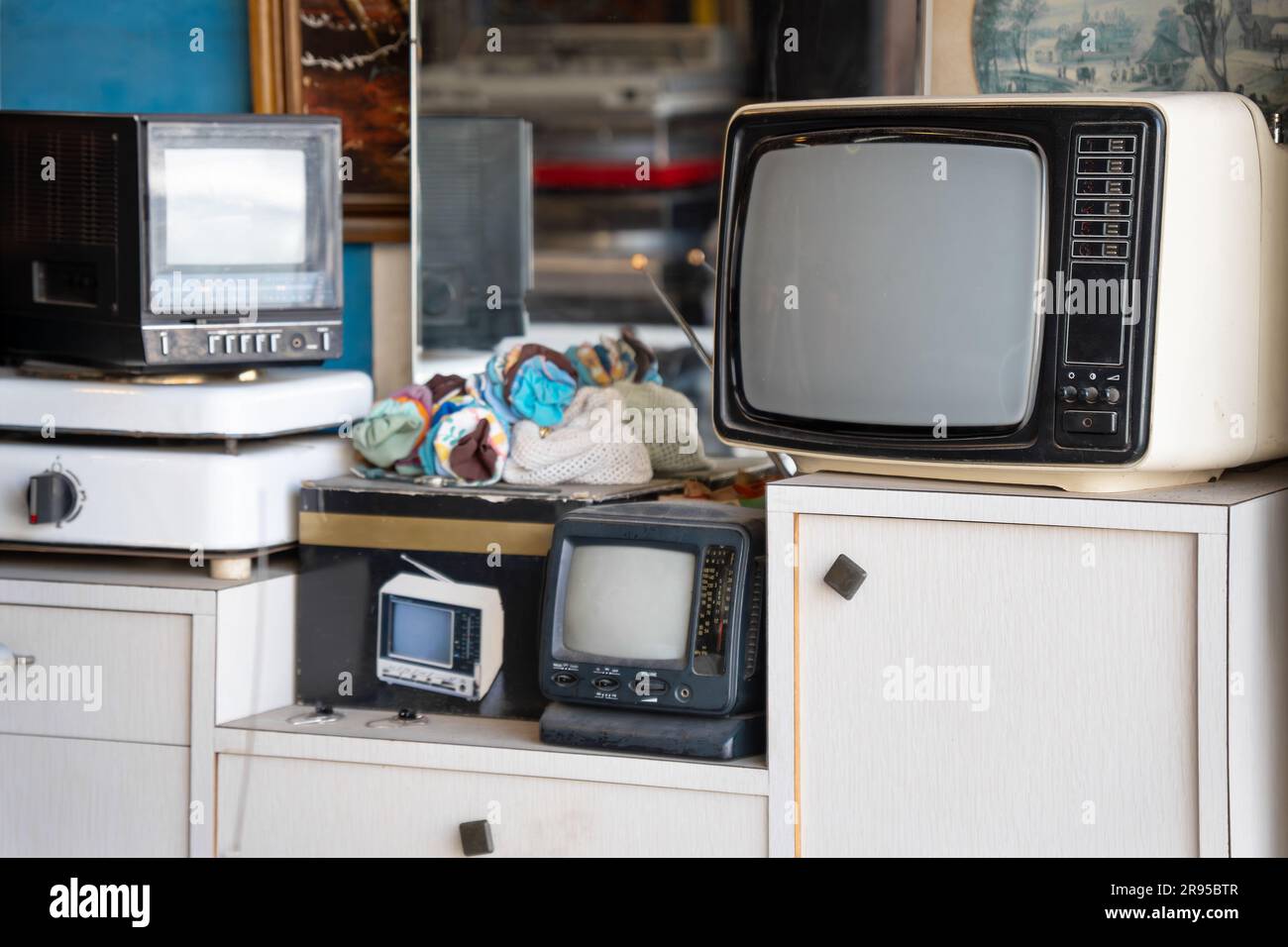 Old TV sets in a junk shop Stock Photo