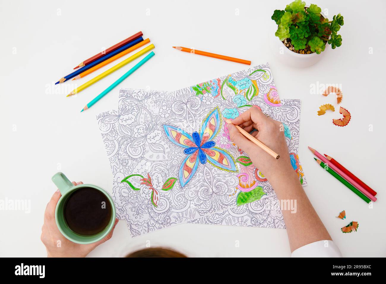 Adult coloring anti stress page or coloring book, self care and mental health, leisure option and hobby Stock Photo