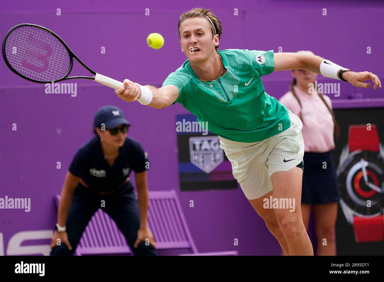 Sebastian Korda, of the US, hits a forehand to Carlos Alcaraz, of Spain, during their mens singles semifinal match at the Queens Club tennis tournament in London, Saturday, June 24, 2023