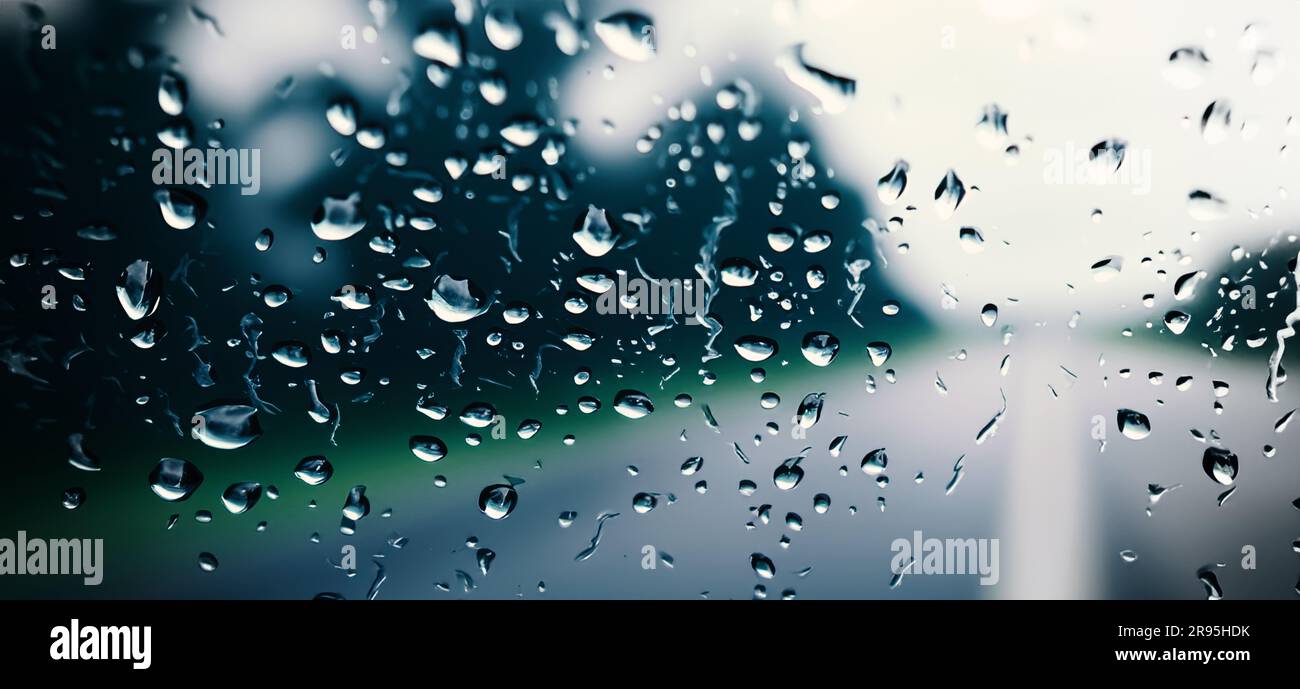 rain droplets on car windshield, traffic in city Stock Photo - Alamy