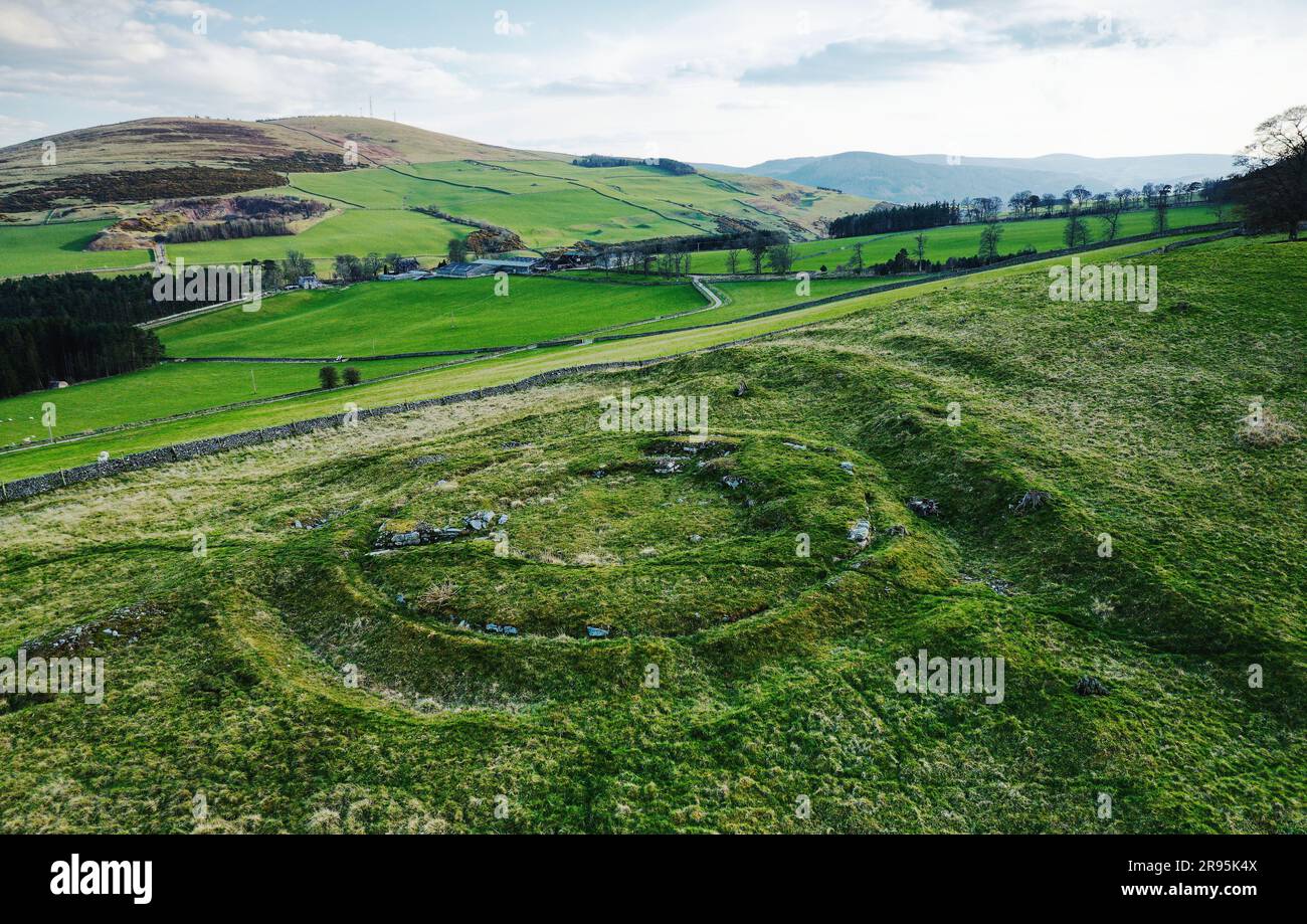 Torwoodlee prehistoric broch circular stone foundation circa 100 AD beside ramparts of older Iron Age fort. Showing entrance and intramural chambers Stock Photo