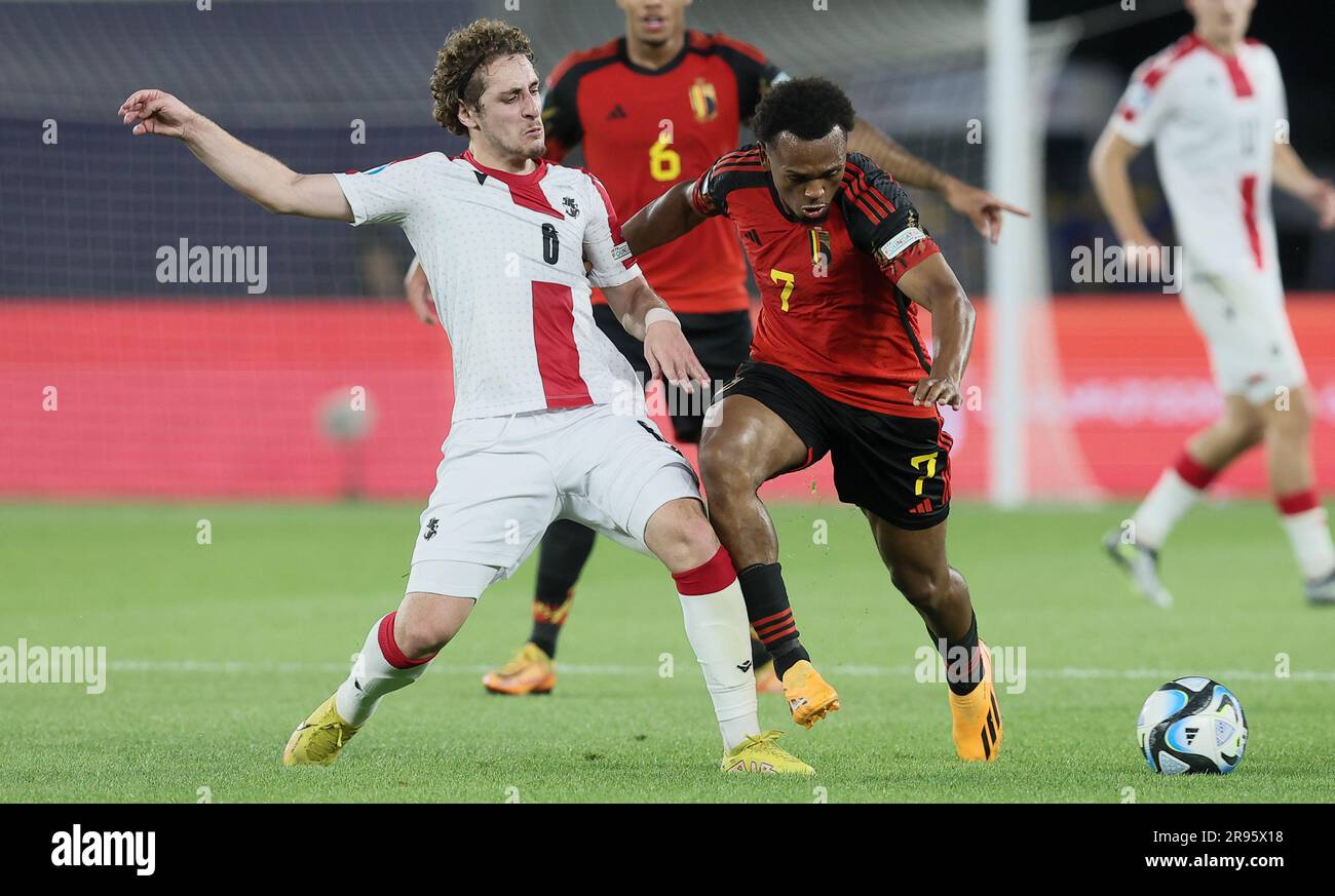 Tbilisi, Georgia. 24th June, 2023. Georgia's Luka Gagnidze and Belgium's Lois Openda fight for the ball during the second game of the group stage (group A) between Georgia and Belgium at the UEFA Under21 European Championships, in Tbilisi, Georgia, Saturday 24 June 2023. The UEFA Under21 European Championships take place from 21 June to 08 July in Georgia and Romania. BELGA PHOTO BRUNO FAHY Credit: Belga News Agency/Alamy Live News Stock Photo
