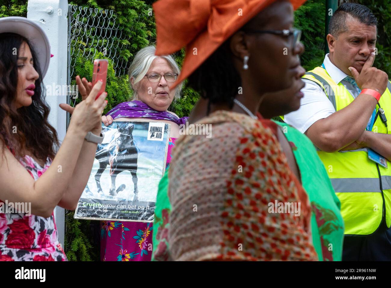 Ascot, UK. 24th June, 2023. An animal rights campaigner protests outside Ascot racecourse as racegoers arrive for the fifth day of Royal Ascot. 28 horses died in jumps and flat races at Ascot between 2012-2022. Credit: Mark Kerrison/Alamy Live News Stock Photo