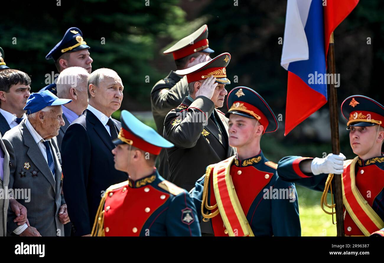 Russian President Putin attends wreath-laying at Tomb of the Unknown Soldier. To the right of Putin is Russia's Defense Minister Sergei Shoigu. (Photo: Russian President's Office) Stock Photo