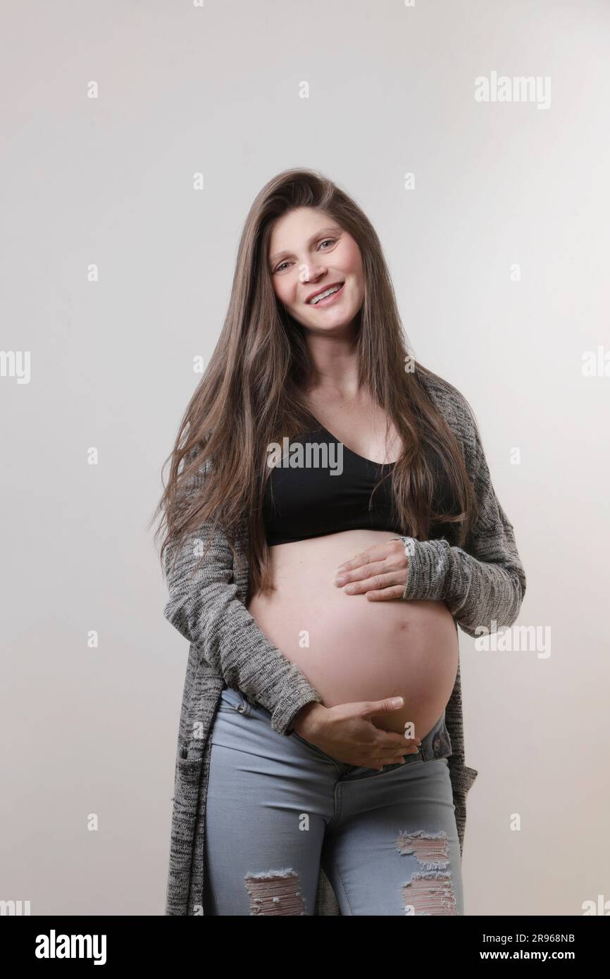 pregnant caucasian woman in casual dress Stock Photo