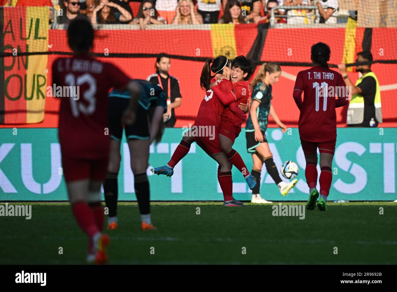 Offenbach, Germany. 24th June, 2023. Soccer, women: Internationals, Germany - Vietnam, Stadion Bieberer Berg. Vietnam's Nguyen Thi Thanh Nha (l) and Ngan Thi Van Su are happy about the goal for 2:1. Credit: Sebastian Christoph Gollnow/dpa/Alamy Live News Stock Photo