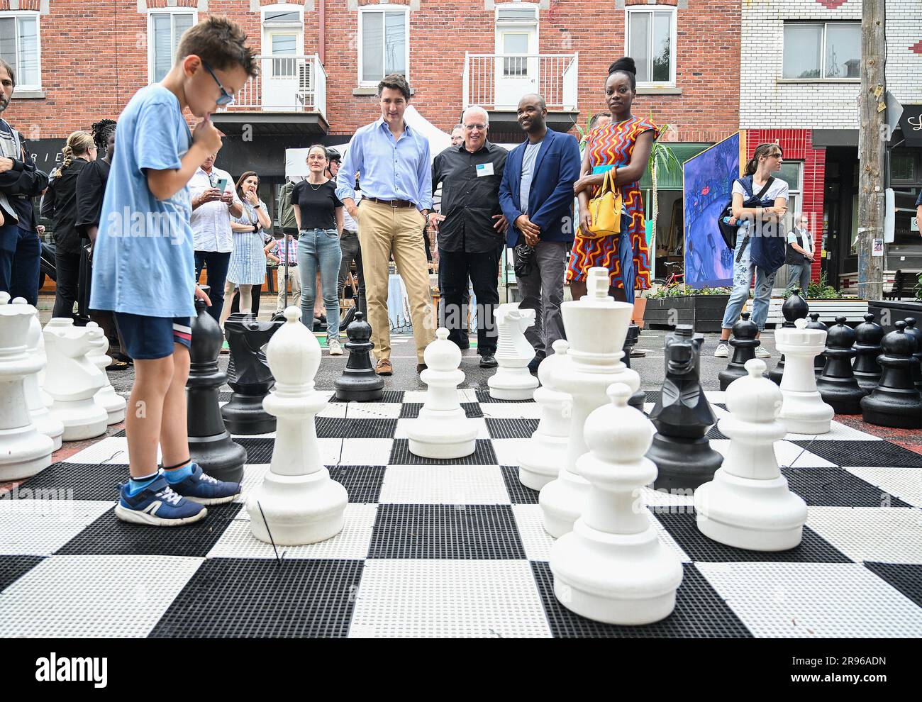 The little boy ponders the next chess move. Stock Photo