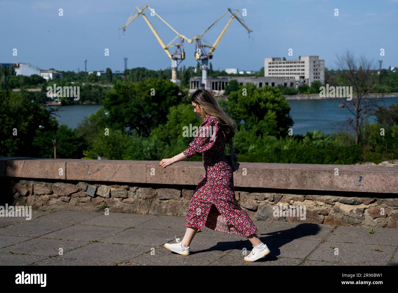 Mykolajiv, Ukraine. 24th June, 2023. Woman is walking at the street in Mykolaiv, Ukraine, June 24, 2023. Credit: Ondrej Deml/CTK Photo/Alamy Live News Stock Photo