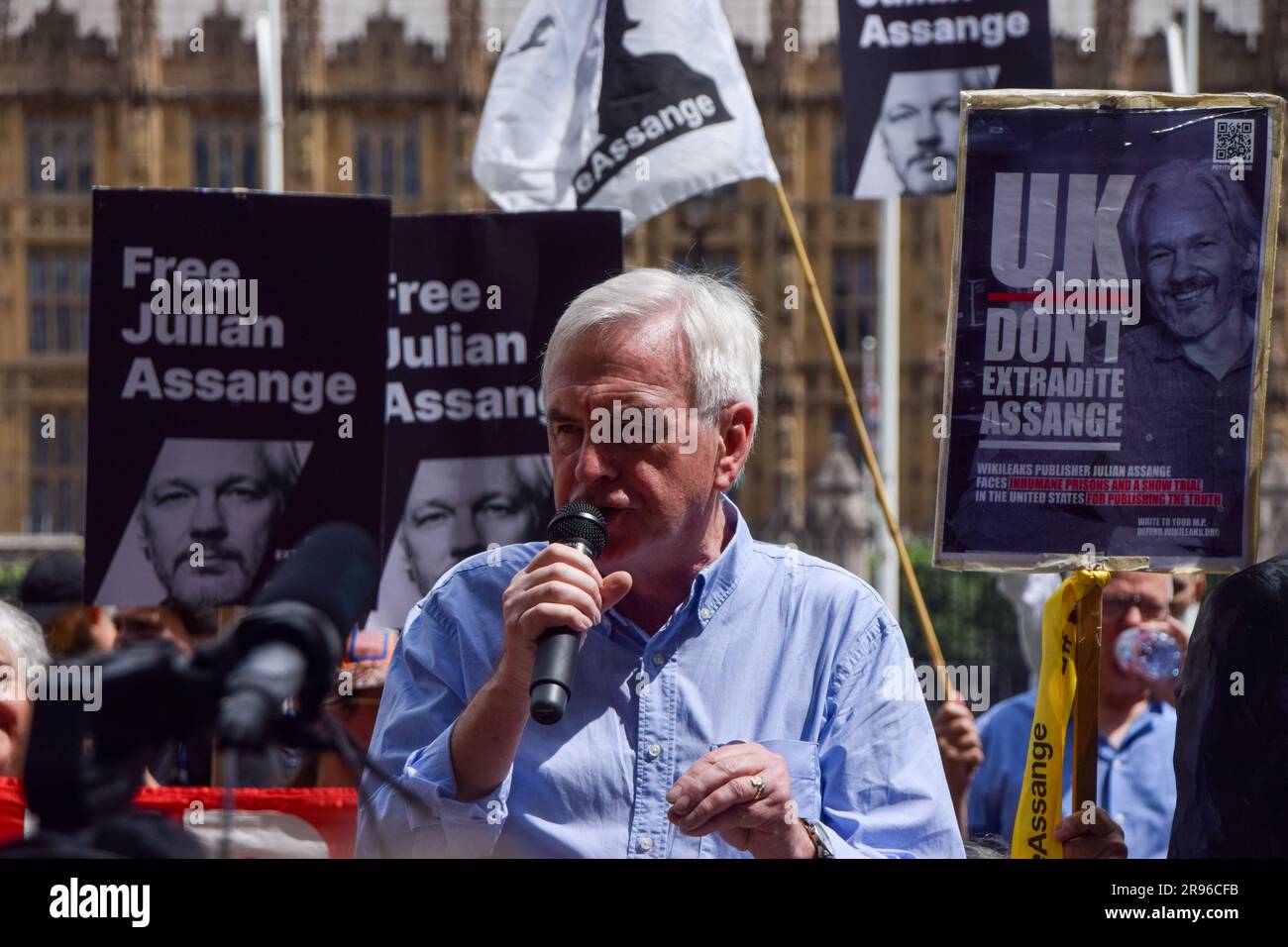 London, UK. 24th June 2023. Labour MP John McDonnell gives a speech in Parliament Square as protesters gathered calling on the UK Government to free Julian Assange and not to extradite him to the US. Stock Photo