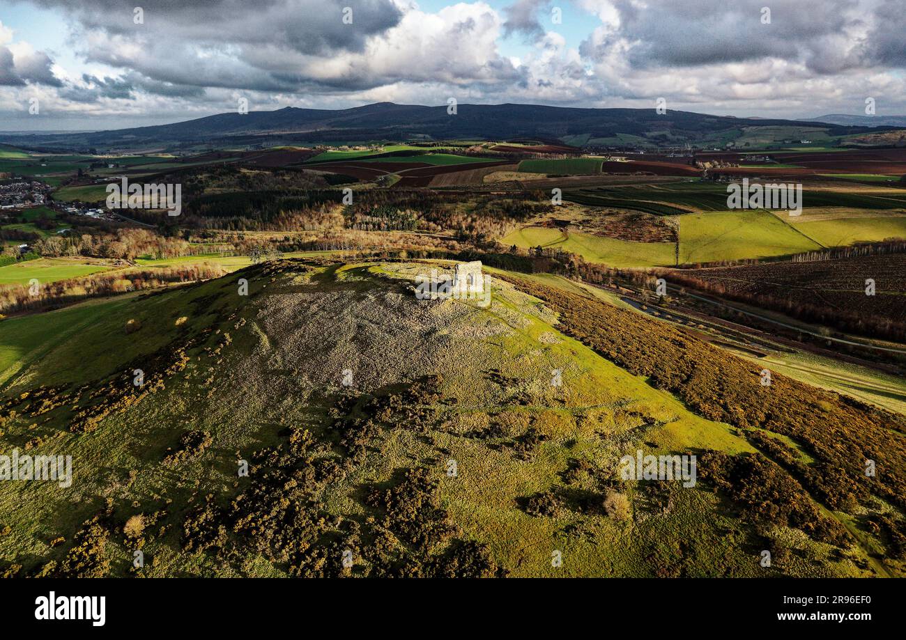 Dunnideer prehistoric hillfort c250 BC showing concentric ramparts. and ruined medieval Dunnideer Castle tower house. Near Insch, Grampian, Scotland Stock Photo