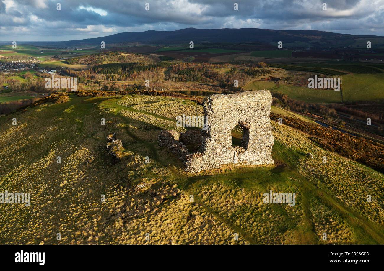 Dunnideer ruined medieval castle tower house built c1260. Near Insch, Grampian, Scotland. Built inside prehistoric c250 BC hillfort. View from NW Stock Photo