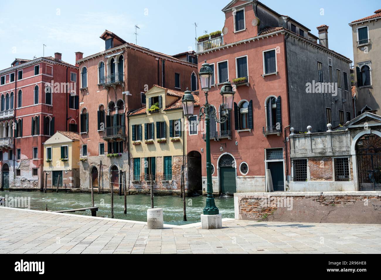 Beautiful old houses and one of the famous canals seen in Venice, Italy