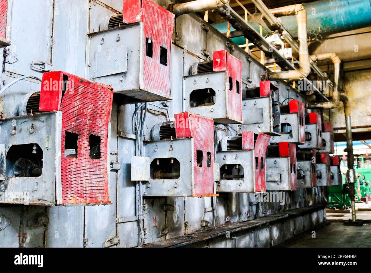 Iron metal red cabinets for perforated electric grid equipment located ...