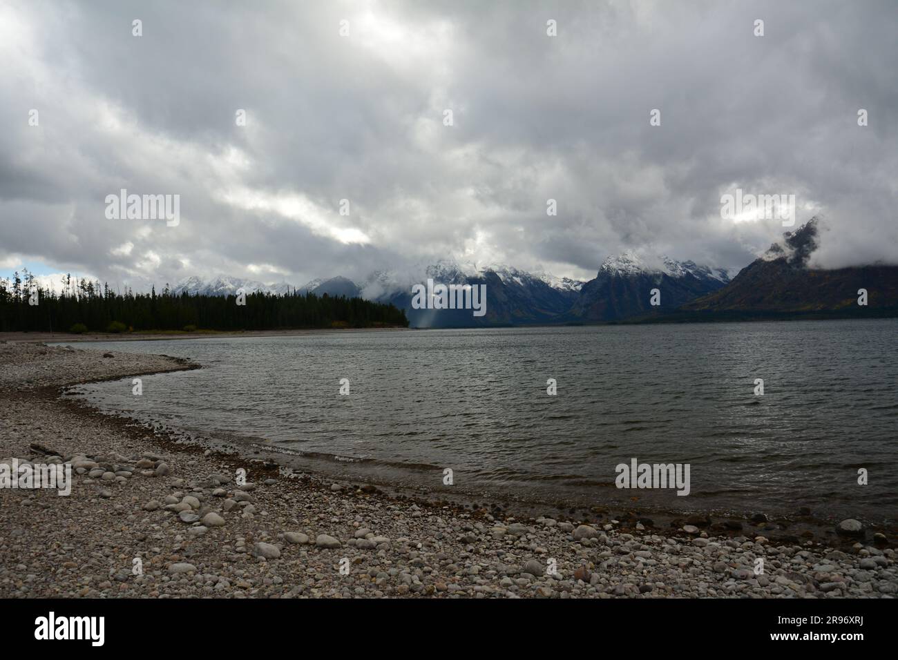 view of the snow-capped  tetons on a stormy day  in fall from colter bay in grand teton national park, wyoming Stock Photo