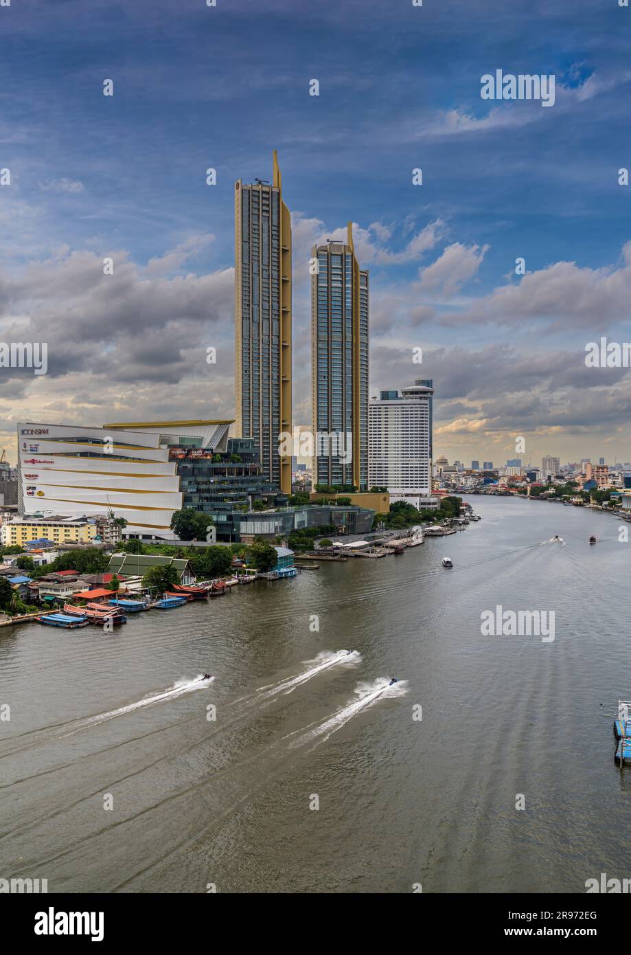 High viewpoint of the Chao Phraya River with Jet skis ICON SIAM Shopping Mall and residential skyscrapers. Stock Photo