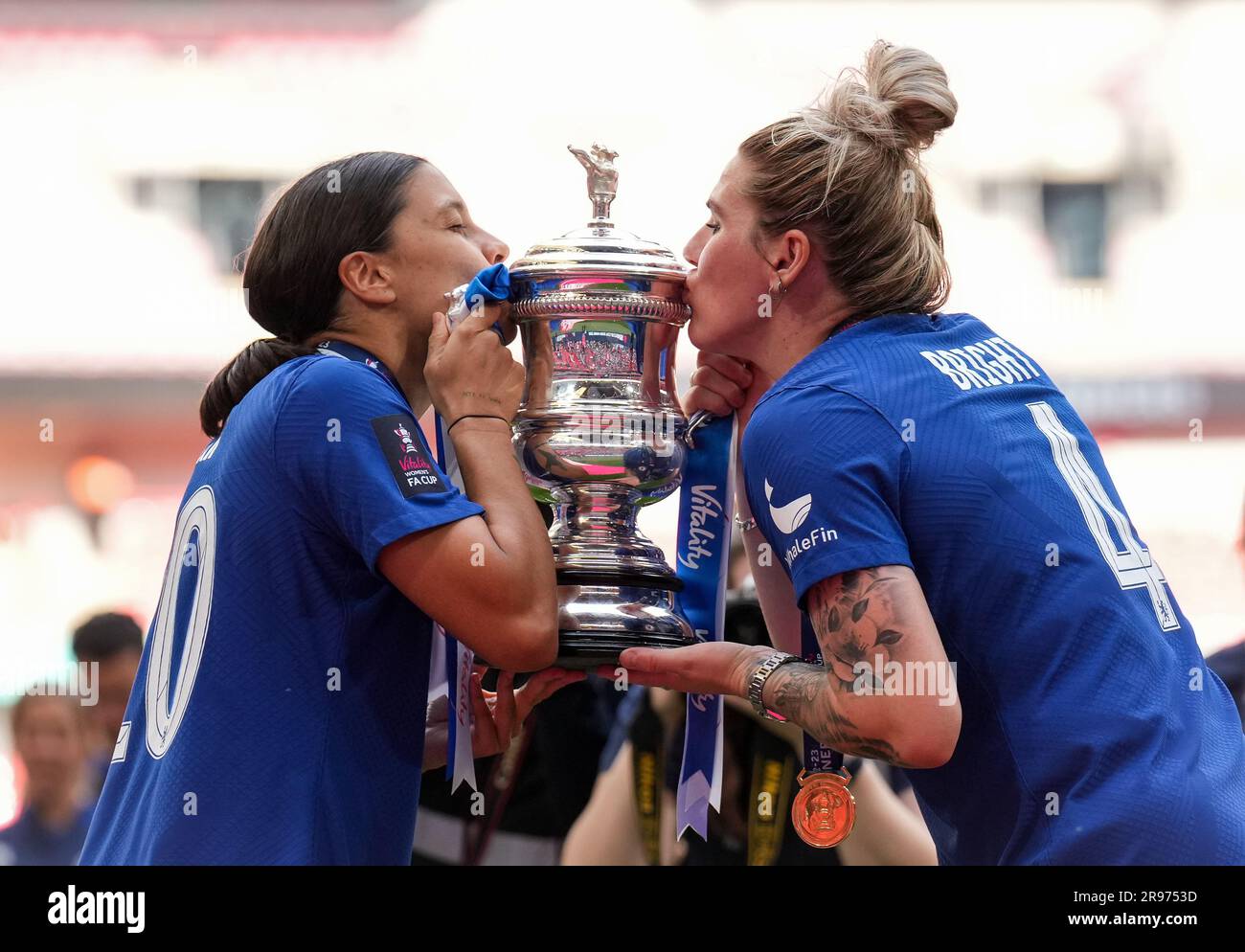 Sam Kerr & Millie Bright of Chelsea Women kiss the winning trophy