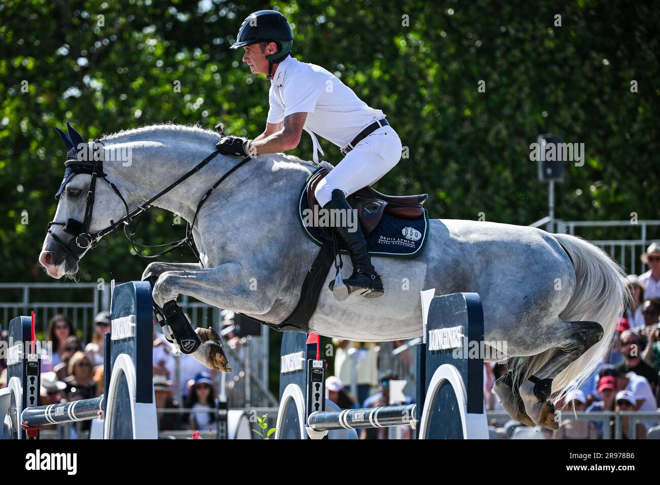 Paris, France. 24th June, 2023. Denis LYNCH of Ireland riding Iberio during the Longines