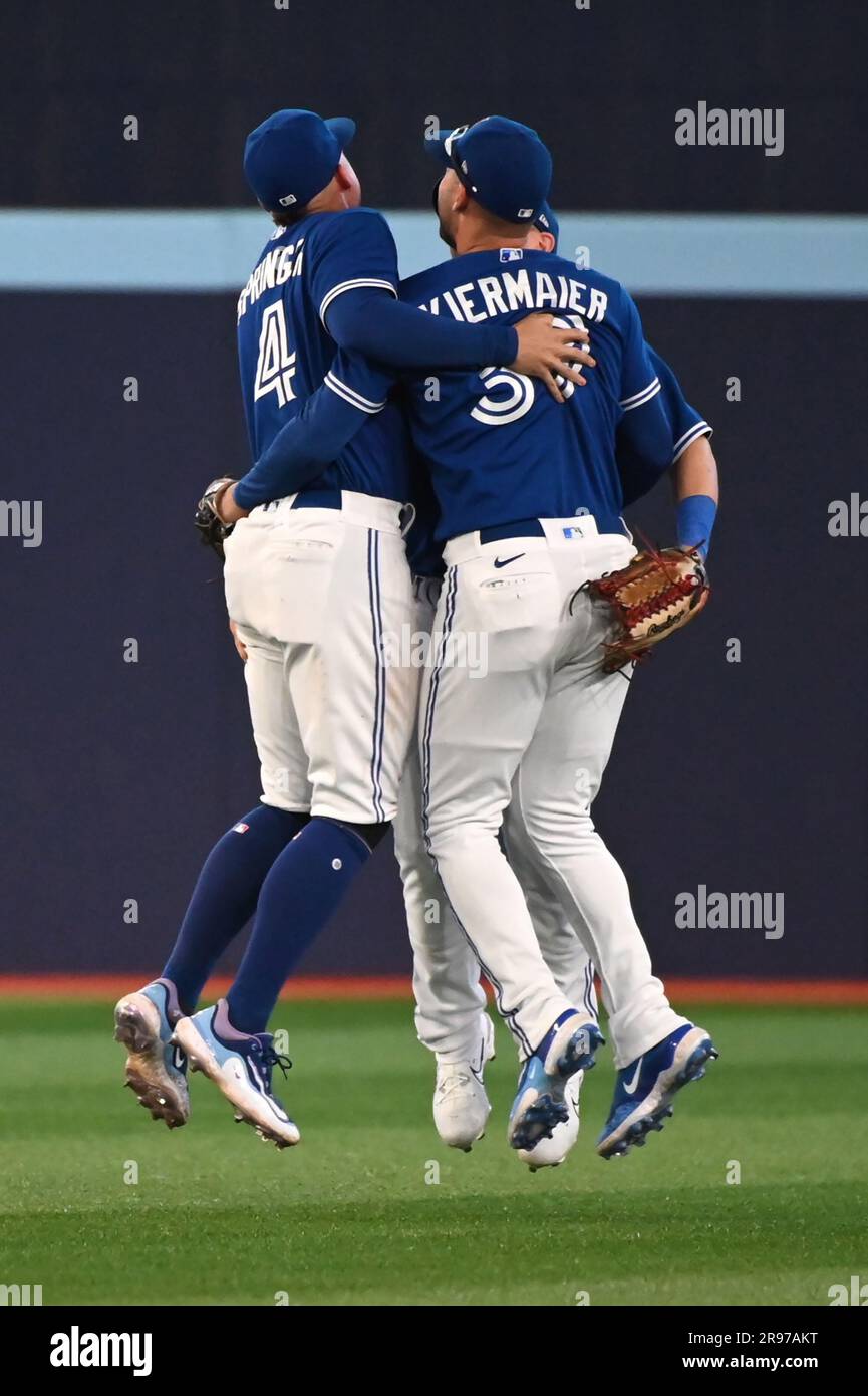 Toronto, Canada. 24th June, 2023. Toronto Blue Jays centre fielder George  Springer (4), right fielder Daulton Varsho (25) and centre fielder Kevin  Kiermaier (39) celebrate after beating the Oakland Athletics in American