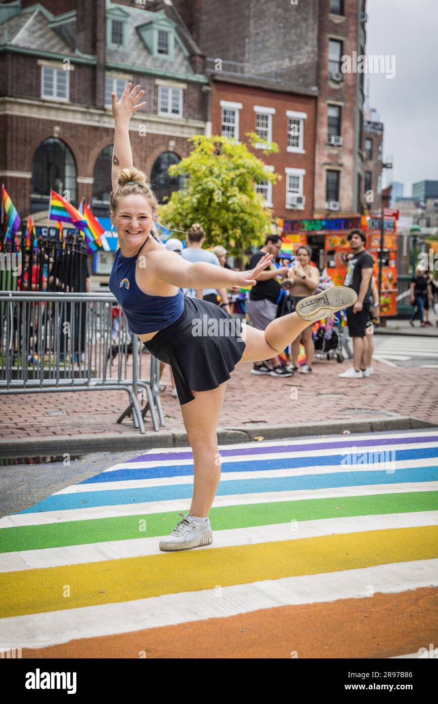 A crosswalk is decorated in rainbow colors in honor of LGBTQIA  pride month in front of the Stonewall bar on Manhattan Island in New York, USA. 06th Apr, 2023. (Photo: Vanessa Carvalho) Credit: Brazil Photo Press/Alamy Live News Stock Photo