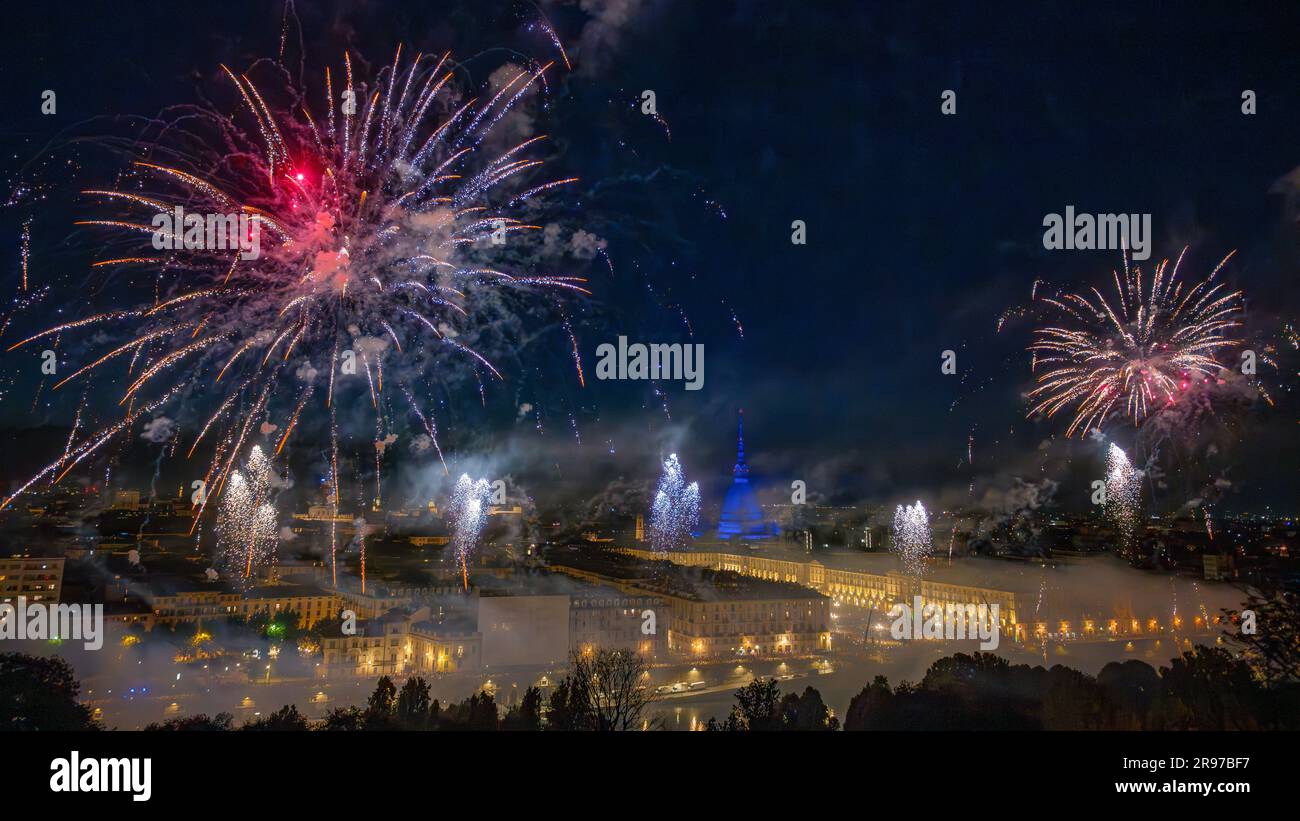 Turin, Italy. 25 June 2023. Fireworks explode during a pyrotechnics show part of celebration for St. John's Day. The Nativity of John the Baptist (San Giovanni Battista) is observed annually on 24 and it is public holiday in Turin as St. John is the patron saint of the city. Credit: Nicolò Campo/Alamy Live News Stock Photo