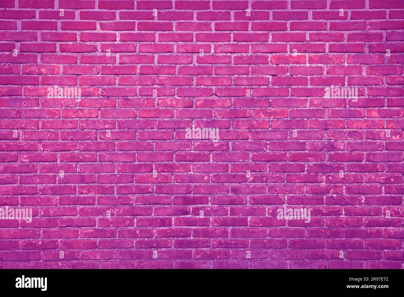 Texture of bright pink brick wall as background Stock Photo - Alamy