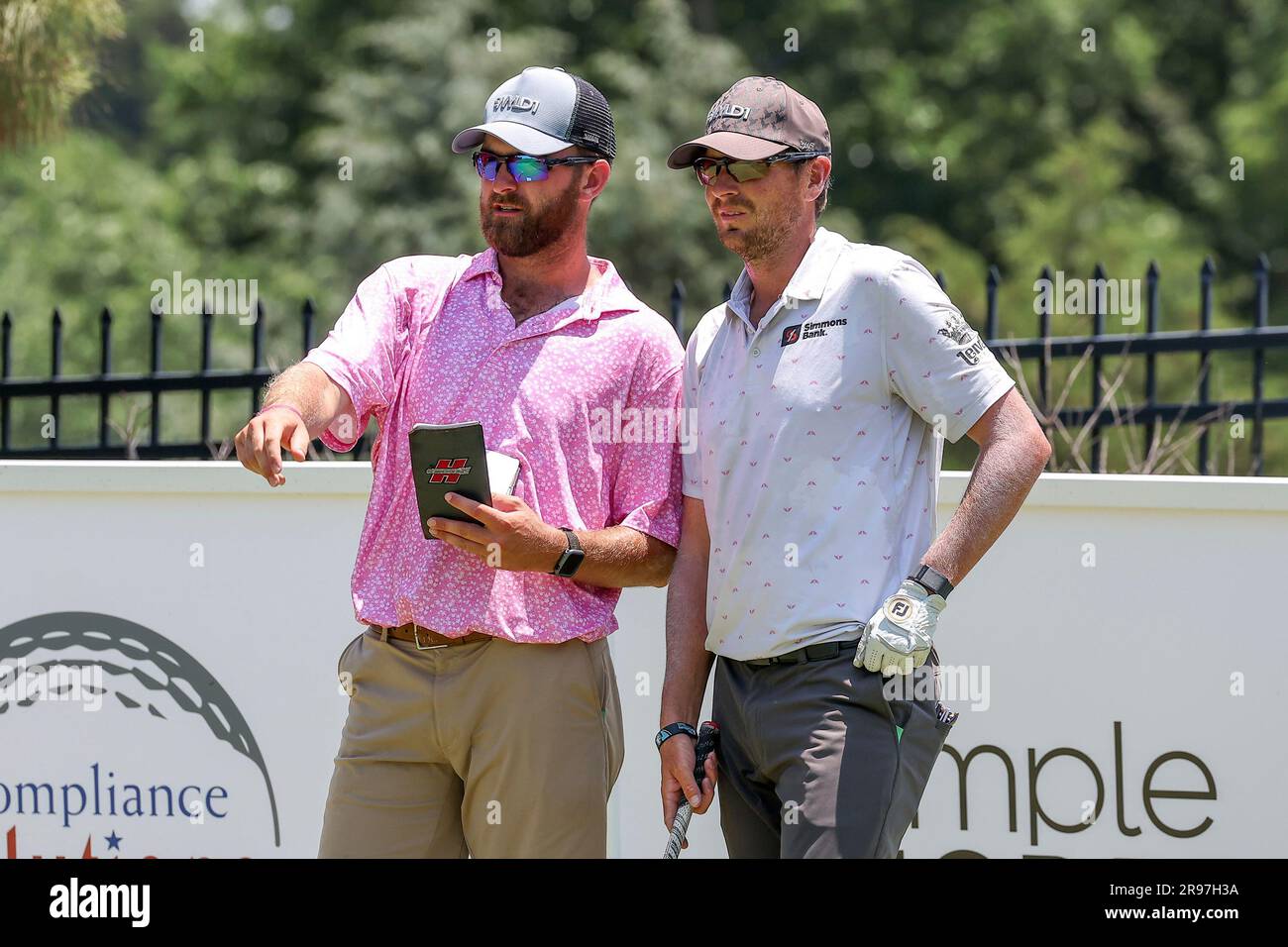 June 24, 2023 Zack Fischer confers with his caddie on the 9th hole during the third round of the Korn Ferry Tour Compliance Solutions Championship golf tournament at Jimmie Austin Golf Club